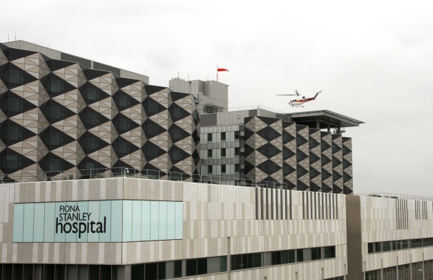Helicopter landing on Fiona Stanley Hospital helipad